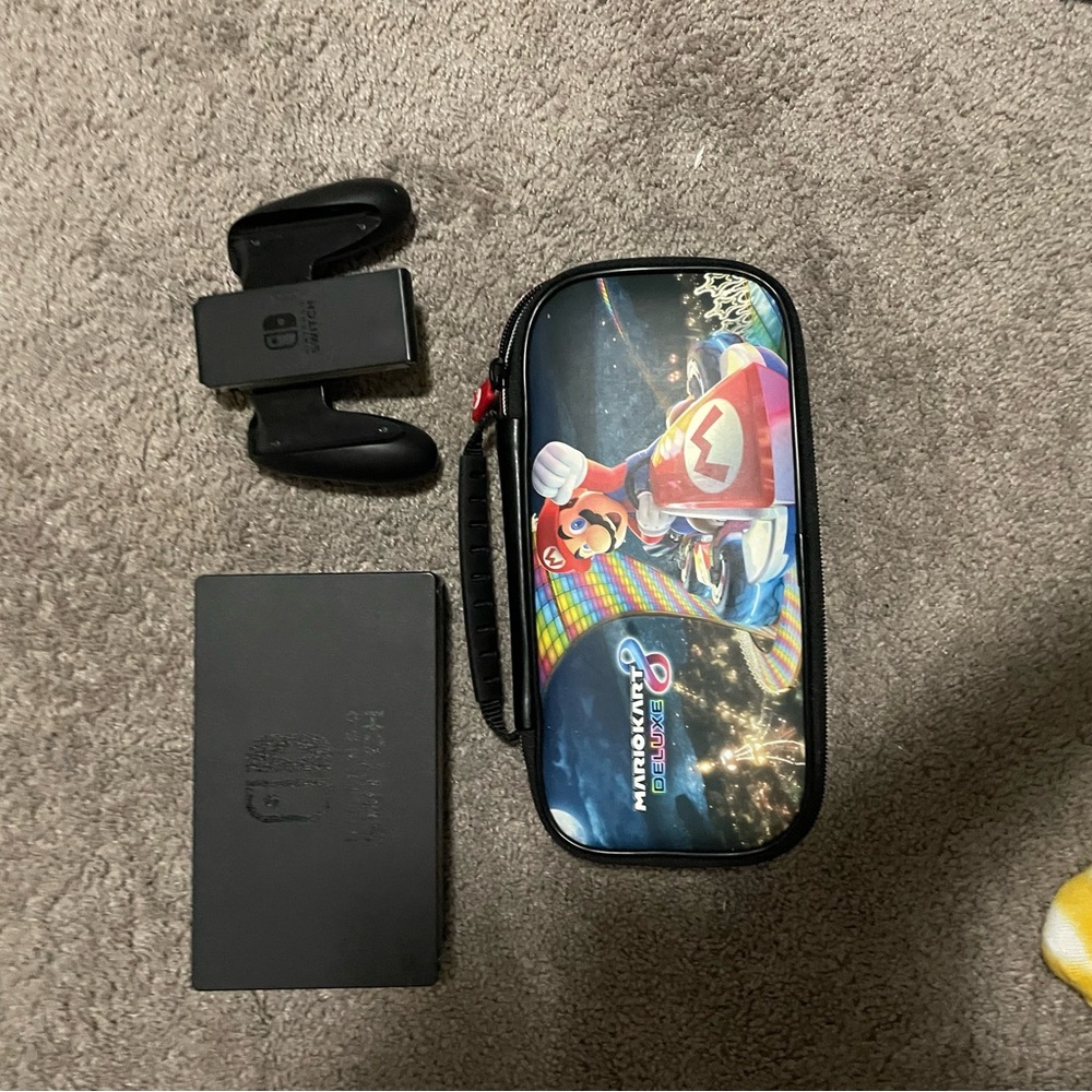 Nintendo Switch Handheld Console with Black Accessories